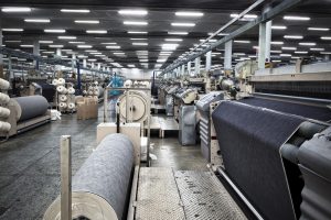 Denim Textile Industry - Weaving Jeans Fabric on Airjet Looms واحد بافت پارچه شرکت تولیدی و صنعتی ترومل